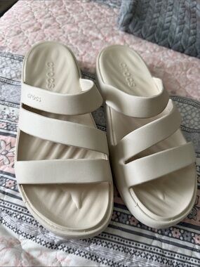 CROCS Triple-Strap Slide Sandals in Cream